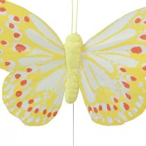 Artículo Mariposas decorativas sobre plumas de alambre amarillo anaranjado 7×11cm 12ud