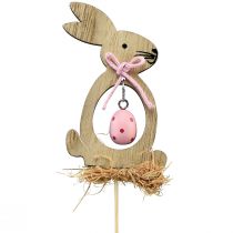 Artículo Tapón de flores tapón decorativo de madera conejo con huevo 5x8,5cm 12 piezas