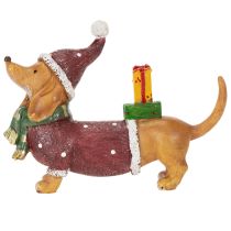 Artículo Figura decorativa de perro salchicha con paquete de regalo y sombrero, 18 cm.