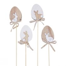 Artículo Tapón floral decoración de Pascua huevo de madera con conejito natural 5×7cm 12 piezas