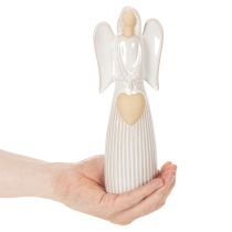 Artículo Figura de ángel con decoración de corazón en color blanco crema, 23 cm.