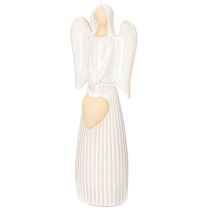 Artículo Figura de ángel con decoración de corazón en color blanco crema, 23 cm.