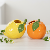 Artículo Jarrón con motivos cítricos, naranja y limón, un accesorio decorativo extravagante para el hogar, ideal para el verano. 10 cm, 2 unidades.