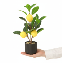 Artículo Decoración de limonero artificial de 28 cm en maceta, color verde y amarillo.