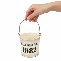 Artículo Cubo decorativo con asa “Original 1982” Crema Ø12/10cm Juego de 2 piezas
