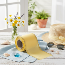 Artículo Cinta decorativa de moiré para coronas, color amarillo con borde dorado, 100 mm de ancho y 25 m de largo, ideal para floristería y decoración.