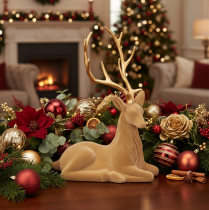 Artículo Figura decorativa de un ciervo recostado con astas, decoración flocada, 58 cm.