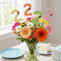 Artículo Tapones numéricos cumpleaños 2 tapones florales madera 27,5cm 16 piezas
