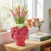 Artículo Busto de poliresina con forma de cabeza de planta, color rosa, 13,5 x 13 x 14 cm