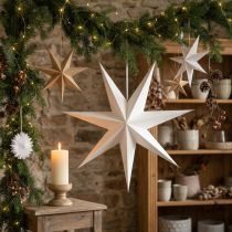 Artículo Decoraciones de estrellas de papel para crear un ambiente festivo, ideales para colgar.