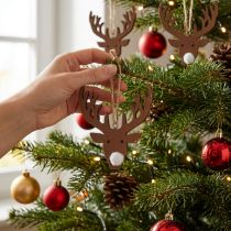 Artículo Colgante navideño Cabeza de alce Madera Marrón, naturale 6,5 x 7cm 8pzs