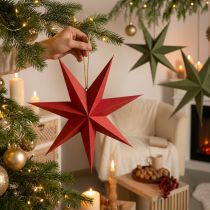 Artículo Estrella navideña de papel con yute para una decoración ambiental.