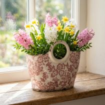 Artículo Maceta decorativa con asa, diseño floral, 21 cm.