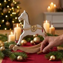 Artículo Caballito balancín de madera, adorno navideño Blanco Dorado Al. 32,5 cm