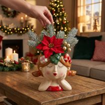 Artículo Cabeza de planta de cerámica para niña, maceta decorativa navideña de 17 cm de alto.