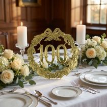 Artículo Aniversario número 100 en oro.