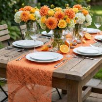Artículo Camino de mesa decorativo no tejido, color naranja, 23 cm de ancho, 25 m de largo.