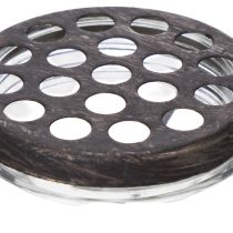 Artículo Botella de vidrio en una cesta de metal, ideal como elemento decorativo en el salón, 20 cm.