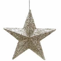 Artículo Estrella purpurina champagne 9,5/5cm 18uds