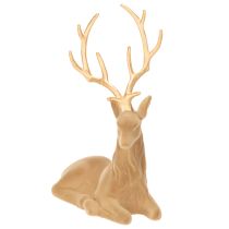 Artículo Figura decorativa de un ciervo recostado con astas, decoración flocada, 58 cm.