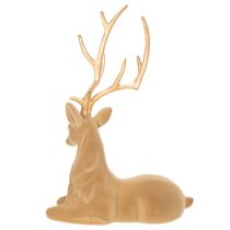 Artículo Figura decorativa de un ciervo recostado con astas, decoración flocada, 58 cm.