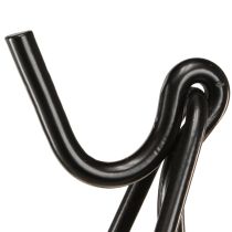 Artículo Portacoronas de pie con gancho, caballete de metal negro, altura 56 cm.