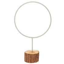 Artículo Anillo decorativo de metal sobre soporte de madera para decoración de mesa, 43 cm.