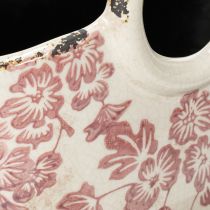 Artículo Maceta decorativa con asa, diseño floral, 21 cm.
