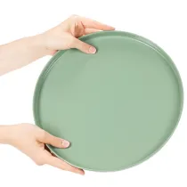 Artículo Plato decorativo redondo verde sobre soporte para mesa, 30 cm.