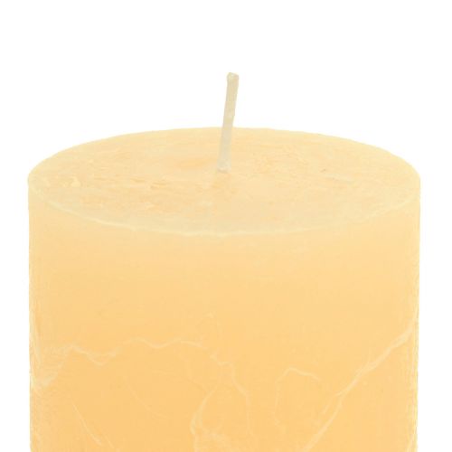 Artículo Velas velas de pilar de color albaricoque claro 60×100mm 4pcs