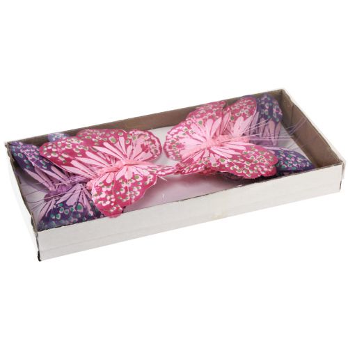 Artículo Mariposas decorativas sobre plumas de alambre rosa violeta 7×10cm 12 piezas