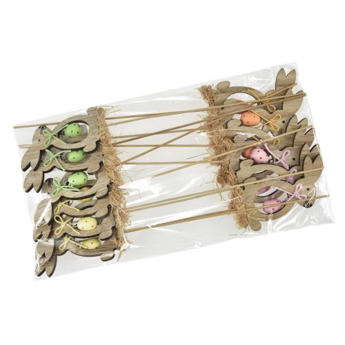 Artículo Tapón de flores tapón decorativo de madera conejo con huevo 5x8,5cm 12 piezas