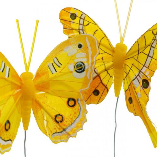 Artículo Mariposas decorativas mariposa de plumas amarillas en alambre 7.5cm 6pcs
