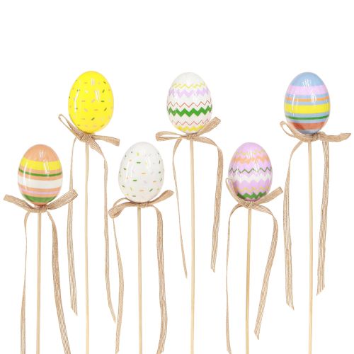 Artículo Plug decorativo huevos de Pascua con lazo colorido 4x5,5cm 12 piezas