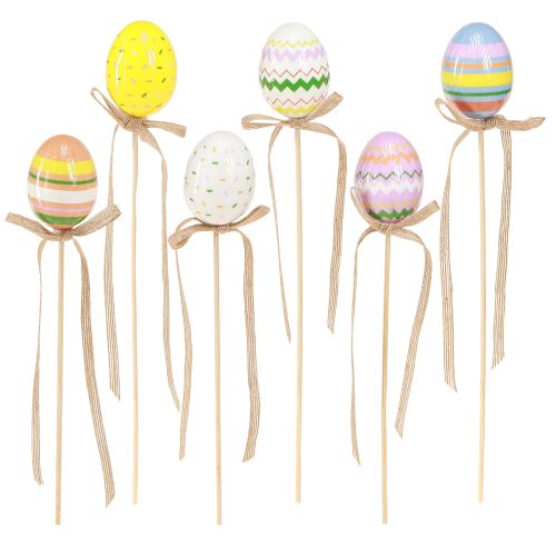 Artículo Plug decorativo huevos de Pascua con lazo colorido 4x5,5cm 12 piezas