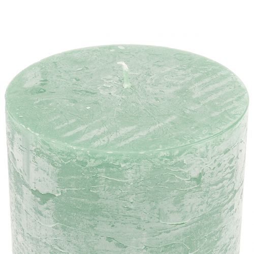 Artículo Velas de color liso verde claro 50x100mm 4uds