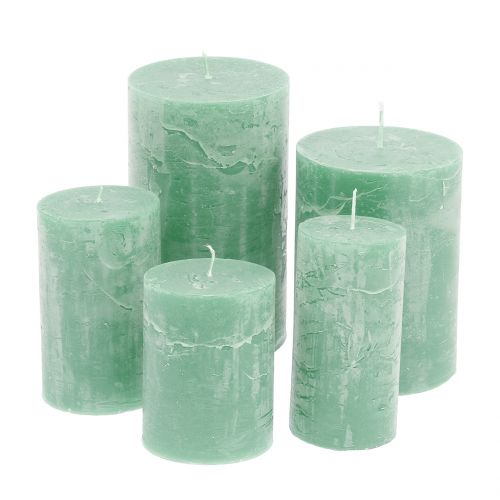 Artículo Velas de colores lisos verde claro de diferentes tamaños