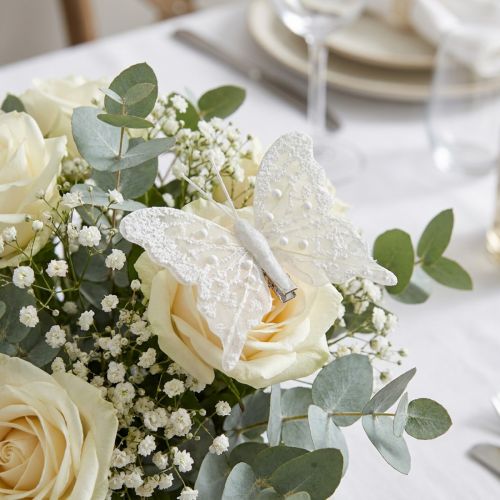 Decoración mariposa en blanco sobre clip 7,5cmx7cm 4 piezas | Floristik24.es