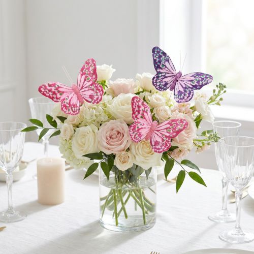 Mariposas decorativas sobre plumas de alambre rosa violeta 7×10cm 12 piezas | Floristik24.es