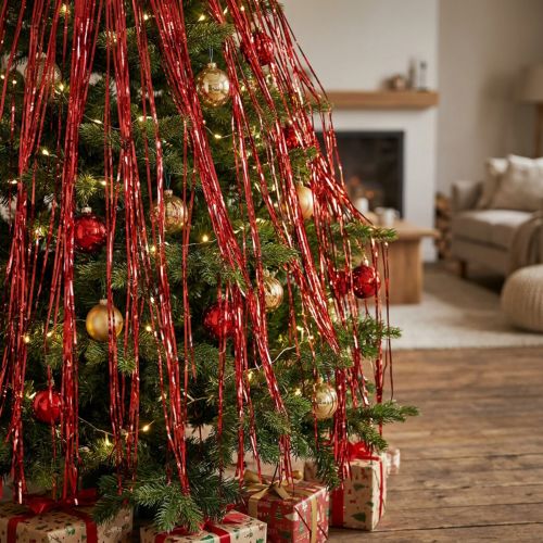 Decoración glamurosa de puerta con oropel para fiestas y celebraciones. | Floristik24.es