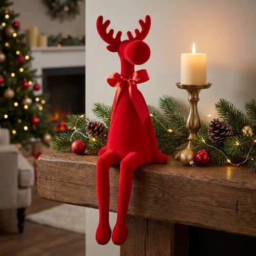 Artículo Figura decorativa de alce con lazo, sentado, para colocar sobre estante, 54 cm.