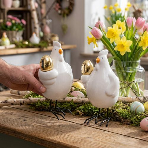 Gallina decorativa con huevo dorado, figura de Pascua porcelana, decoración Pascua gallina H12cm 2pcs | Floristik24.es