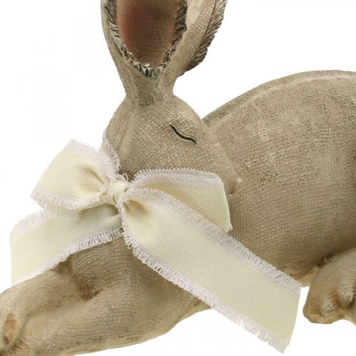 Floristik24 Conejito de Pascua tumbado con lazo Decoración Pascua Poliresina 28cm