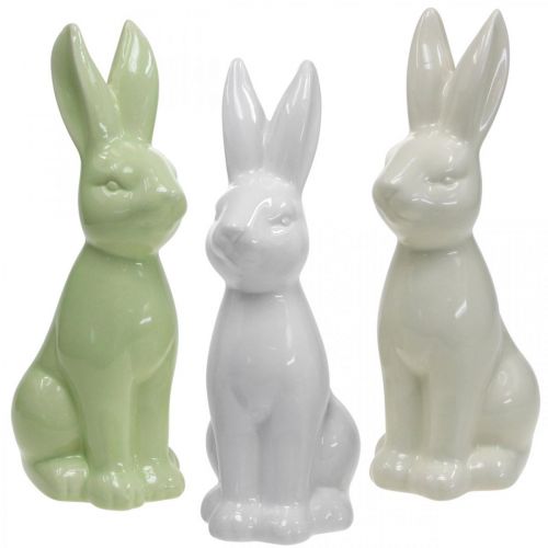 Artículo Conejo de Pascua de porcelana sentado blanco, crema, verde H18cm 3pcs