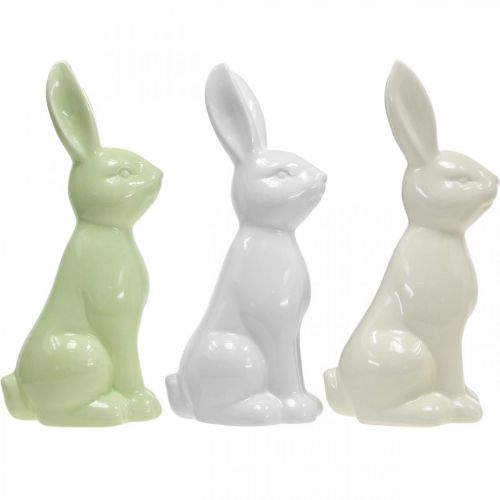 Artículo Conejo de Pascua de porcelana sentado blanco, crema, verde H18cm 3pcs