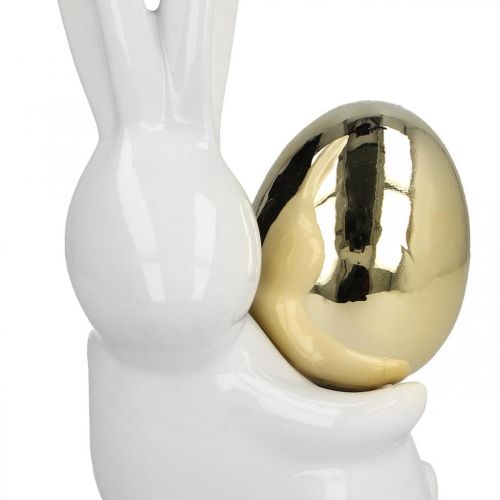 Floristik24 Conejitos de Pascua elegantes, conejitos de cerámica con huevo dorado, decoración de Pascua blanco, dorado Al. 18 cm 2 piezas