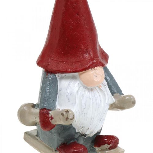 Floristik24 Vela decorativa Elfo navideño, decoración de adviento, elfo con esquís, vela decorativa Al. 12 cm