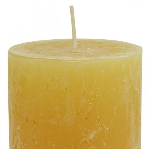 Artículo Velas de pilar Velas rústicas lisas amarillo 70/140mm 4 piezas
