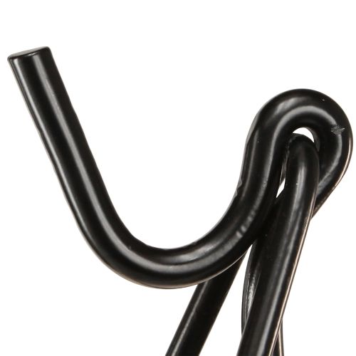 Artículo Portacoronas de pie con gancho, caballete de metal negro, altura 56 cm.