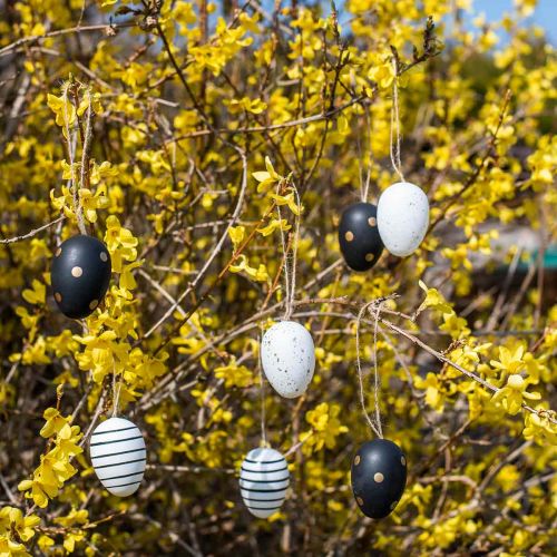 Artículo Huevos de Pascua para colgar Negro Blanco Oro Surtido H6cm 12pcs